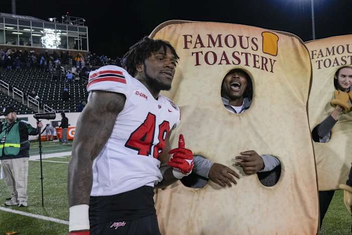 Dec 18, 2023; Charlotte, NC, USA; Western Kentucky Hilltoppers celebrate their win after the second half against the Old Dominion Monarchs at Charlotte 49ers' Jerry Richardson Stadium.